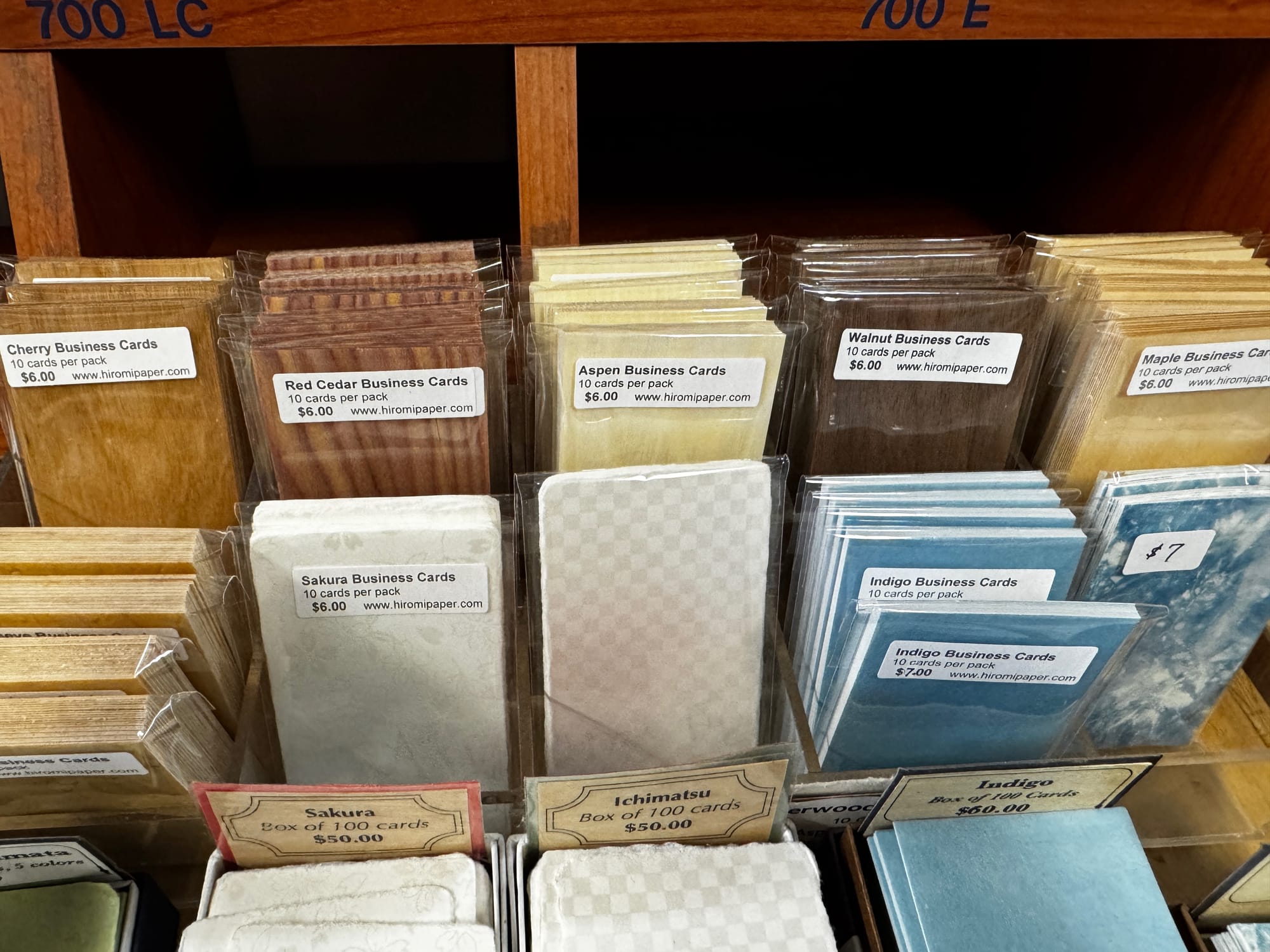 small packages of business cards made of unusual papers